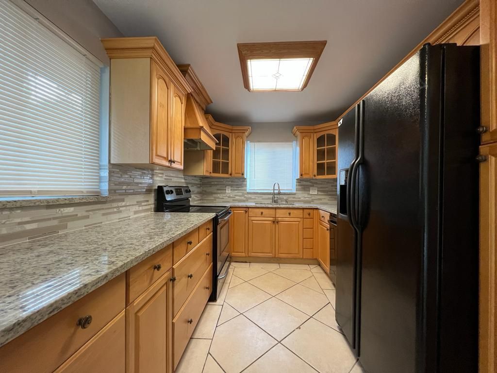 Photo of 1058 SW 23rd Avenue, Boynton Beach, FL 33426 (MLS # R10769449)