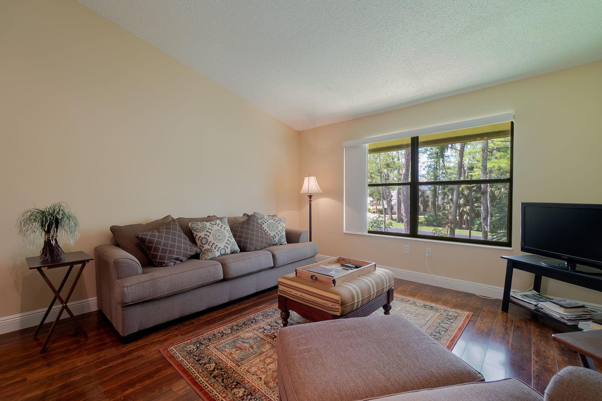 Available for seasonal rental, this charming, one-story, second-floor condo offers a great mix of comfort, convenience, and location for the winter equestrian season. It has 3 bedrooms and 2 bathrooms. This fully furnished unit features a spacious open-concept living and dining area, an in-unit washer and dryer, and all the necessary linens, kitchenware, and essentials. Located just 5 miles from Wellington International, it is a great choice for riders, owners, or anyone involved in the equestrian circuit. Enjoy a peaceful stay in one of Wellington's most desirable communities, with quick access to showgrounds, restaurants, and shopping.