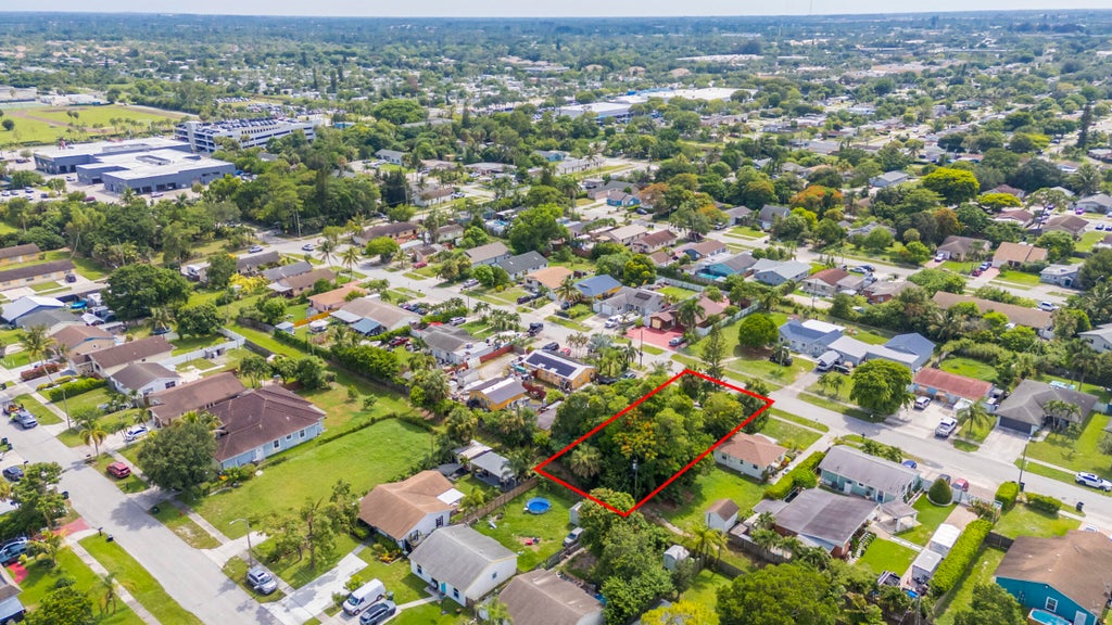 Photo of 240 PERRY Avenue, Greenacres, FL 33463 (MLS # B26065491)