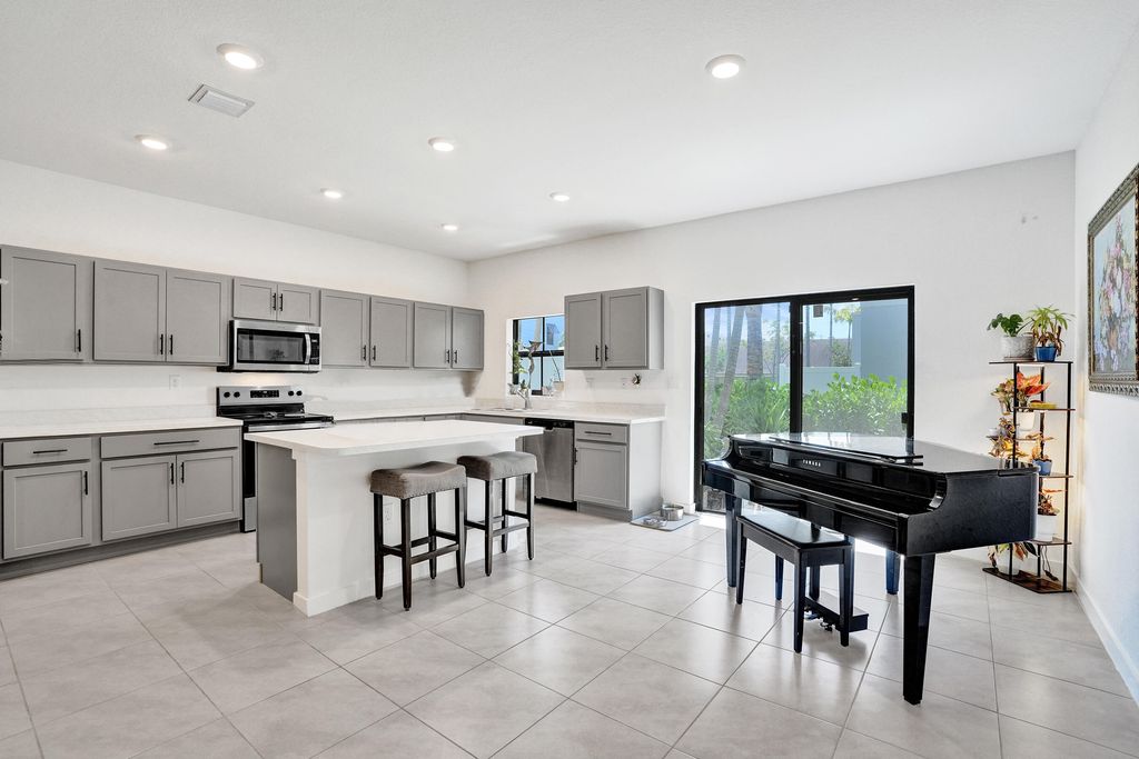 Photo of 975 NW 3rd Terrace, Pompano Beach, FL 33060 (MLS # B26027056)