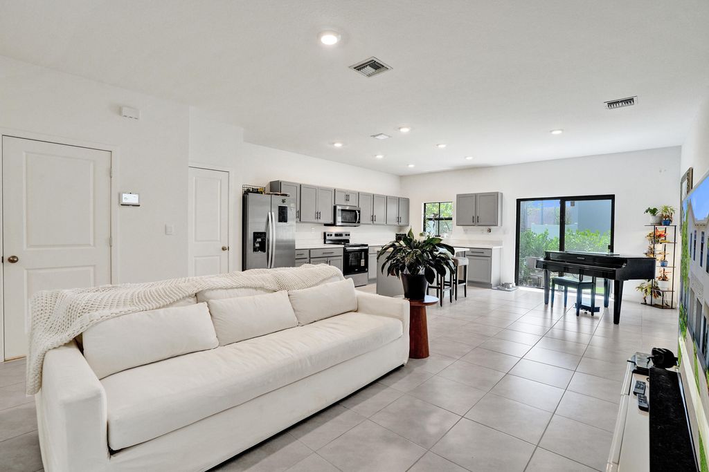 Photo of 975 NW 3rd Terrace, Pompano Beach, FL 33060 (MLS # B26027056)