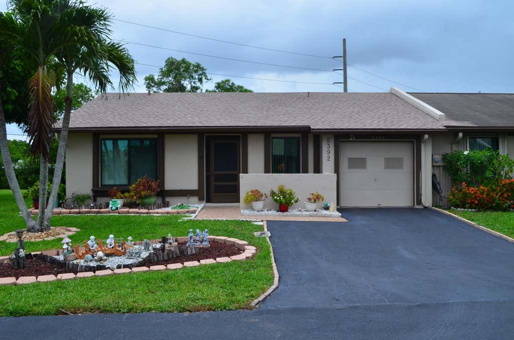 Photo of 5392 Viburnum Circle, Delray Beach, FL 33484 (MLS # B26049362)