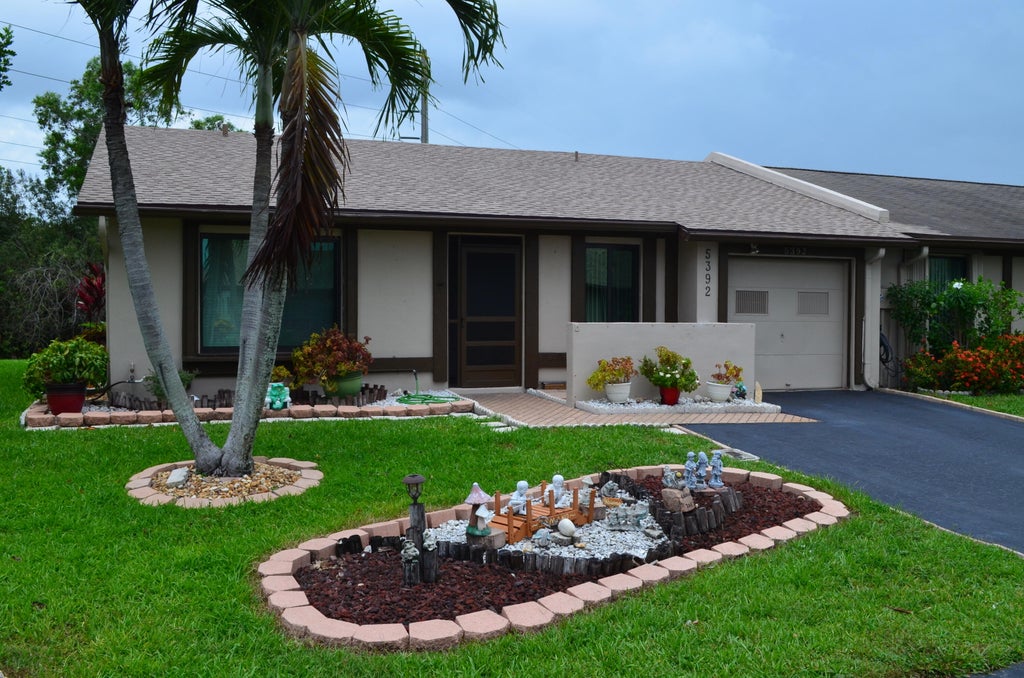Photo of 5392 Viburnum Circle, Delray Beach, FL 33484 (MLS # B26049362)