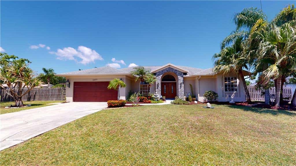 Photo of 2601 SE Clareton Ter, Port Saint Lucie, FL 34952 (MLS # F10329765)