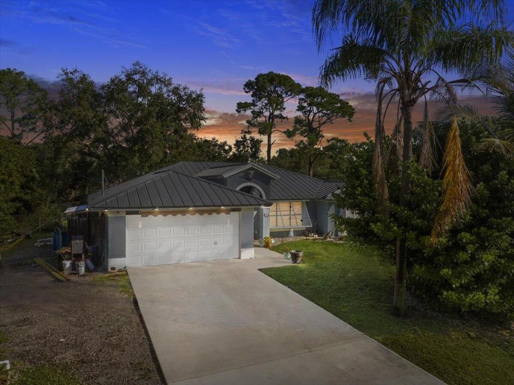 Photo of 7008 Pacific Avenue, Fort Pierce, FL 34951 (MLS # R11136884)