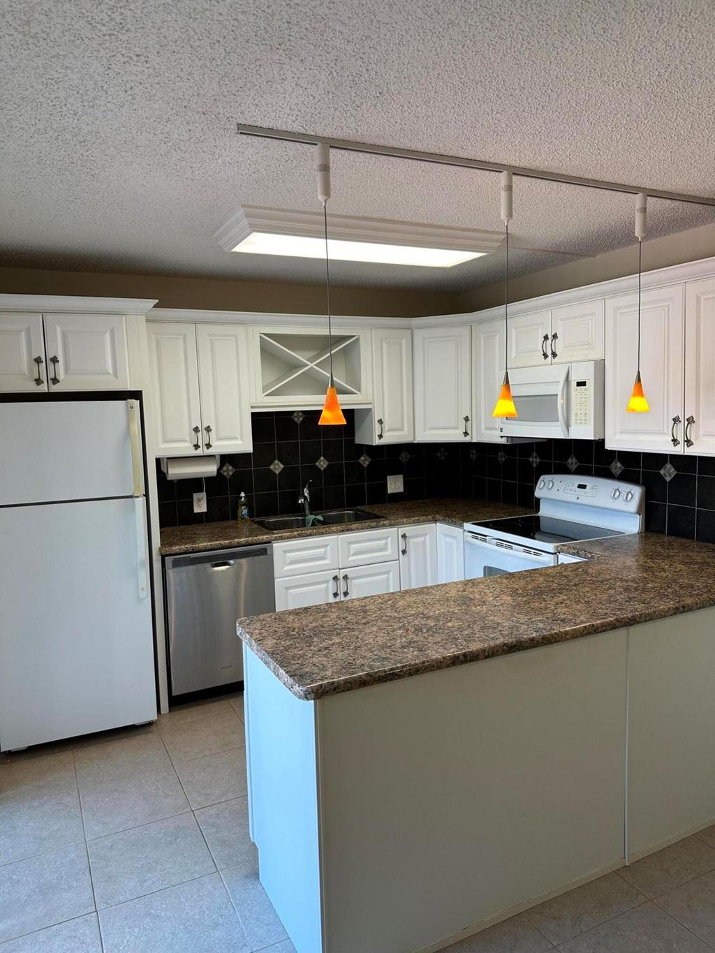 Photo of 6186 SE Riverboat Drive #935, Stuart, FL 34997 (MLS # R11031093)