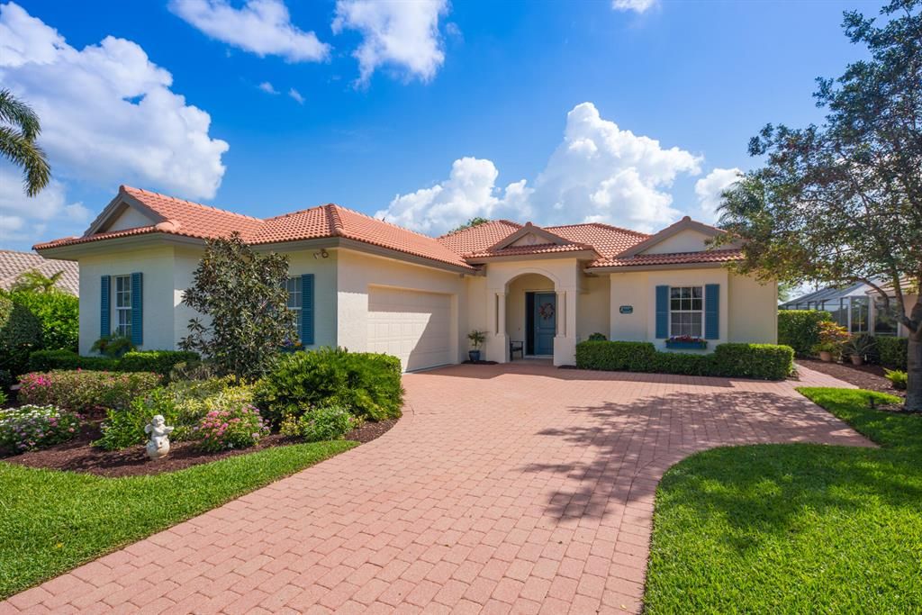 Photo of 11839 SE Plandome Drive, Hobe Sound, FL 33455 (MLS # R10786779)