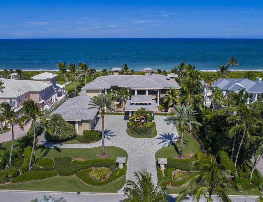 Contemporary residence with 140 ft of ocean frontage.  Seascapes available from all main areas of house & bedroom suites.  Teak wood, Saturnia marble, slate and Coquina stone are featured throughout the residence. Living room has dynamic teak coffered ceiling, floor to ceiling Coquina stone fireplace and full bar.  Chef's kitchen opens to morning room/family area. Second level master suite has ocean & inlet views. Three en suite guest rooms and an en suite study complete the accommodations. Outdoors a pool complex features a raised spa cascading into a half moon pool with vanishing edge.  Entertaining will be a joy from the covered patio and outdoor kitchen. Then take a leisurely stroll on the private dune walk with built-in seating.