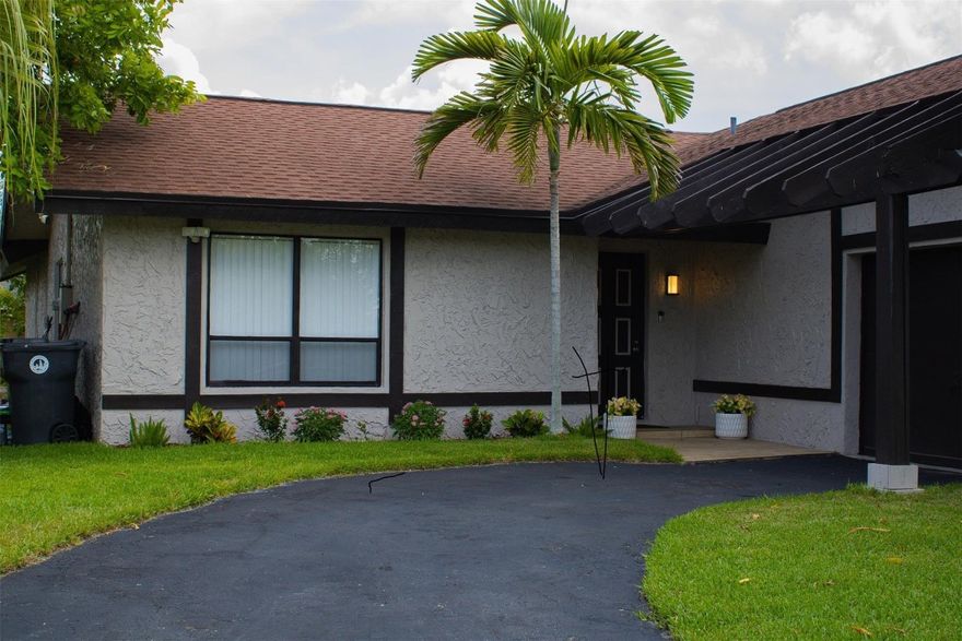 3/2 single-family with approx. 1,402 SF on 6,502 SF lot. Vaulted ceilings, fenced backyard with mango, coconut & ackee trees, room for pool. Roof 2018, A/C 2019, tankless water heater, freshly painted exterior. No HOA. Motivated sellers offering $2500 toward closing costs with full offer. Come see this beautiful home and make it yours! New Year New Home.