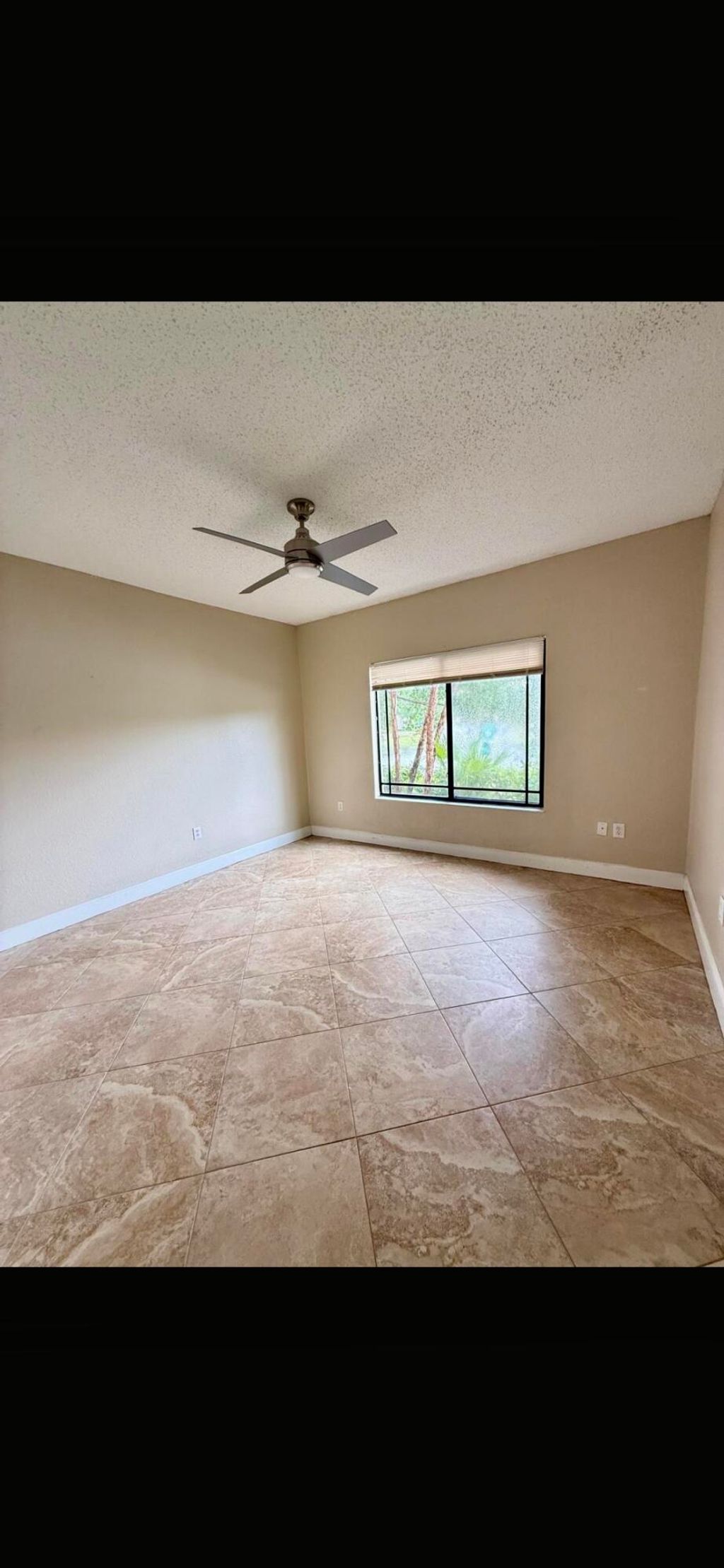 Photo of 2916 Tuscany Court #115, Palm Beach Gardens, FL 33410 (MLS # B26019170)