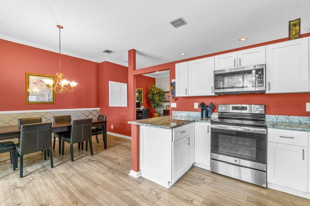 Photo of 5024 Ibis Court, Coconut Creek, FL 33073 (MLS # R10966435)