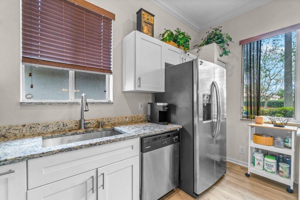 Photo of 5024 Ibis Court, Coconut Creek, FL 33073 (MLS # R10966435)