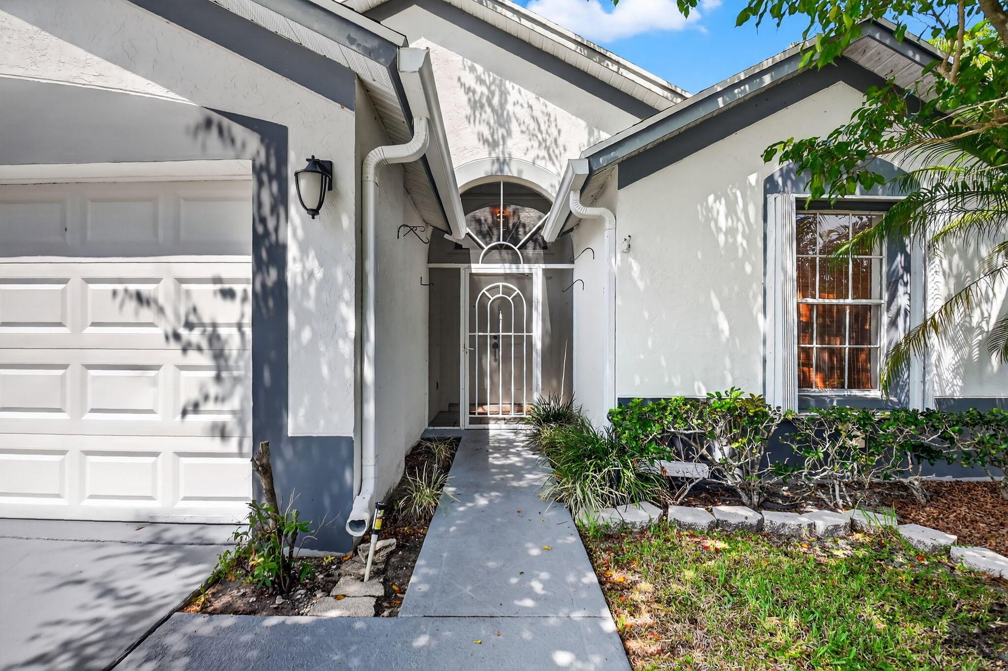 412 Trotters Lane, Greenacres, FL, 33413/$427,000 1 412 Trotters Lane