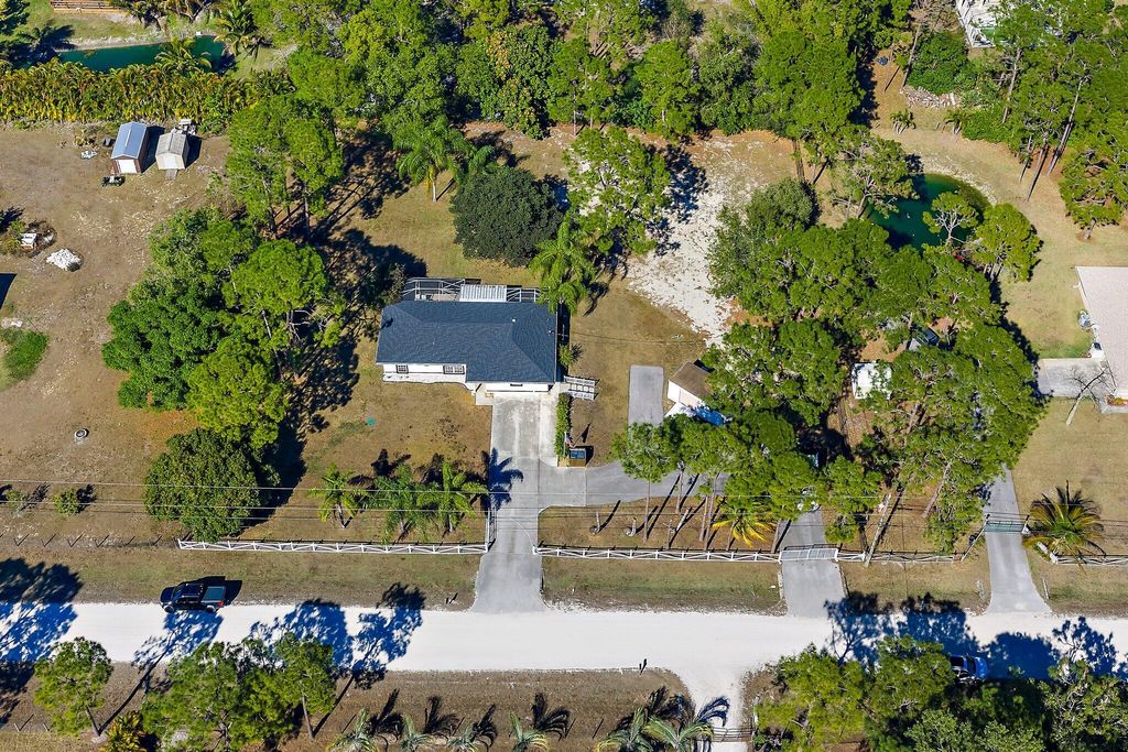 Photo of 18389 N 41st Road N, Loxahatchee, FL 33470 (MLS # R11160522)