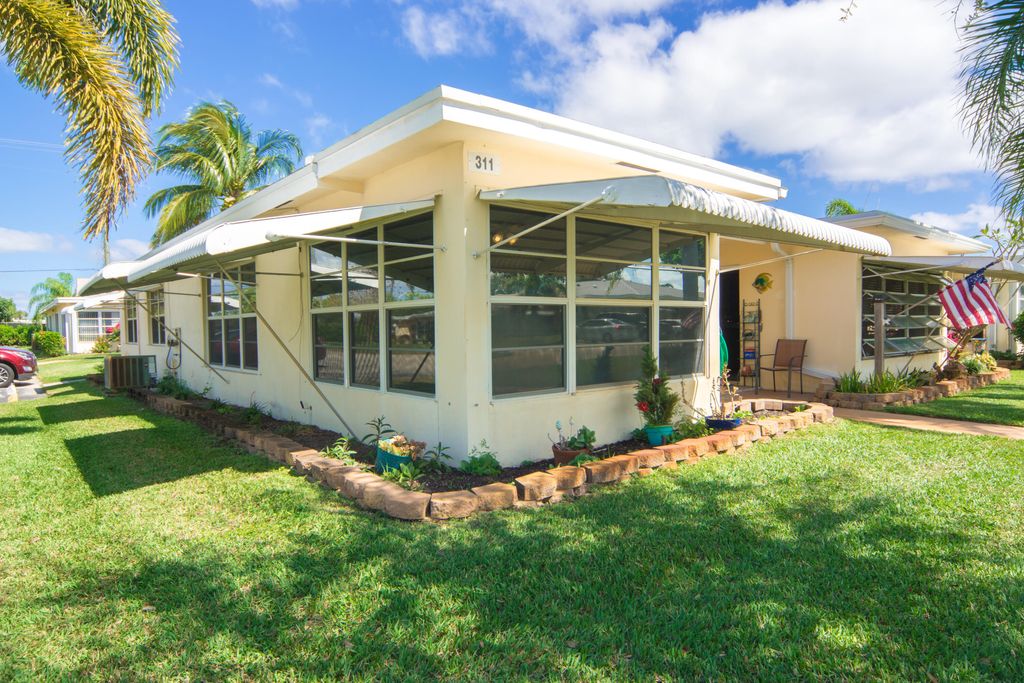 Photo of 311 Country Lane #A, Boynton Beach, FL 33435 (MLS # R10777095)