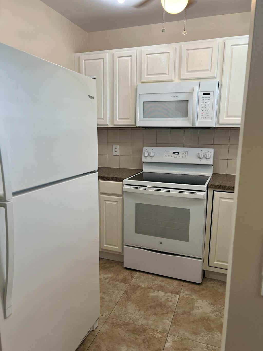 Photo of 9851 SANDALFOOT Boulevard #212, Boca Raton, FL 33428 (MLS # B26062023)
