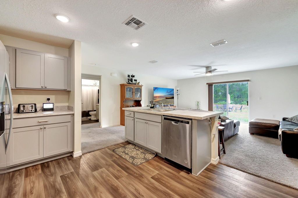 Photo of 2629 SW Harem Circle, Port Saint Lucie, FL 34953 (MLS # R10988279)