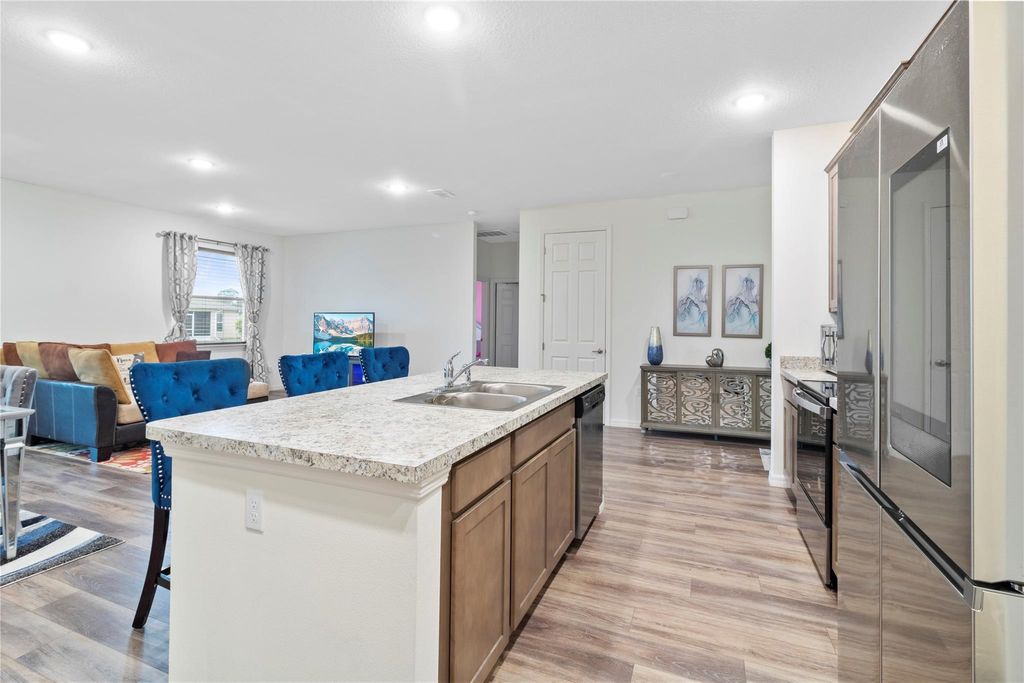 Photo of 714 SW Tupper Lane, Port Saint Lucie, FL 34953 (MLS # F10414125)