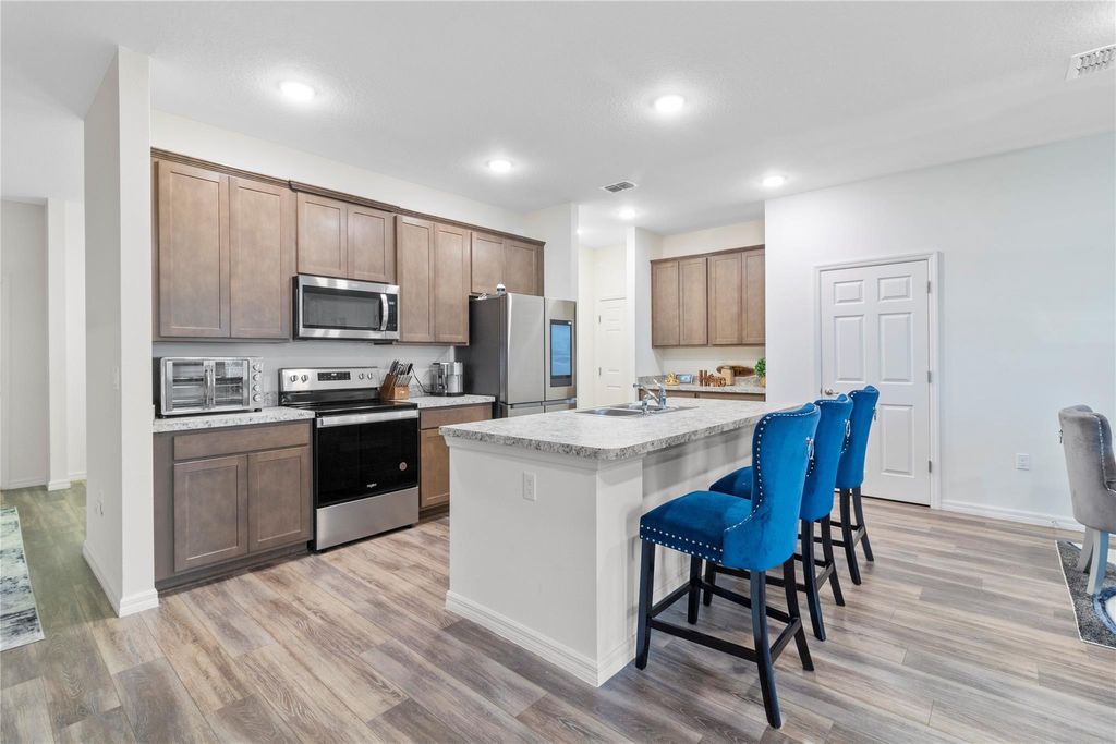 Photo of 714 SW Tupper Lane, Port Saint Lucie, FL 34953 (MLS # F10414125)