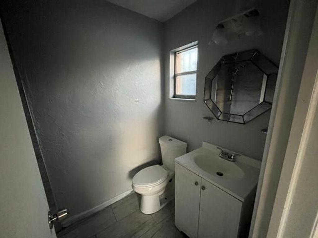 Photo of 621 SW 7th Street, Belle Glade, FL 33430 (MLS # R10980003)