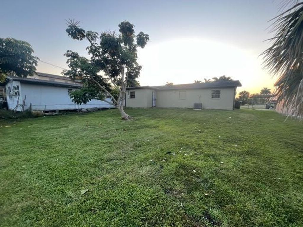 Photo of 621 SW 7th Street, Belle Glade, FL 33430 (MLS # R10980003)