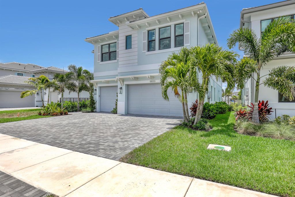 Photo of 10033 Heron Flock Drive, Palm Beach Gardens, FL 33412 (MLS # R11113206)
