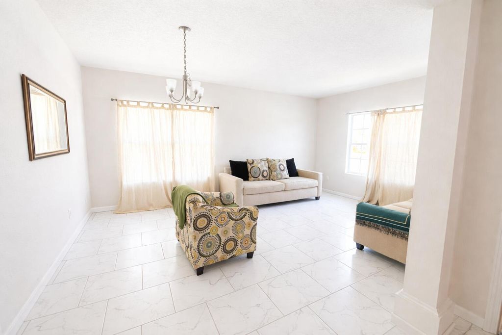 Photo of 1003 Mystery Circle, Davenport, FL 33837 (MLS # B26015450)