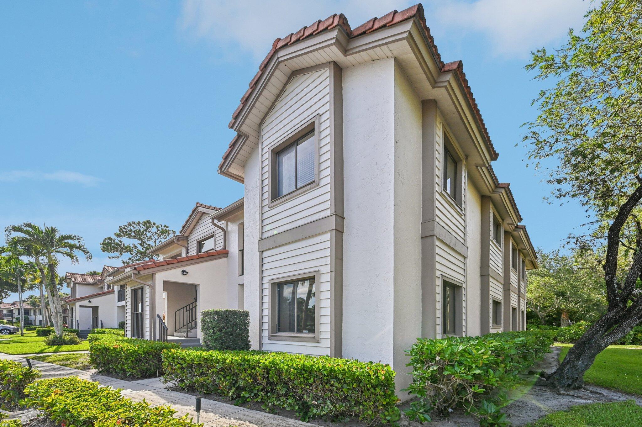 Amazing UPDATED MOVE-IN READY GROUND FLOOR END UNIT CONDO in PGA National Dunbar Woods. 1,434sf + 3 Beds + 2 Full Baths. Freshly painted and move-in ready. Split floor plan, Formal Dining, Eat-in Kitchen, Granite & Newer Appliances, Enclosed tiled Patio, views of tropical lush landscapes. Newer A/C & Well maintained and NO CARPET. Enjoy the Community Pool, relaxation area and walk friendly community. PGA National offers a variety of memberships if you choose to join the club. NO MEMBERSHIP REQUIRED! PGA NATIONAL is a Guard GATED Community with easy access to several world class golf courses, resort & spa, Parks nearby, Turnpike, I-95, Shops and Dining on PGA Blvd, Gardens Mall, Trader Joe's, and only a short drive to PBI airport, and the area's BEST BEACHES. Call for a private showing.