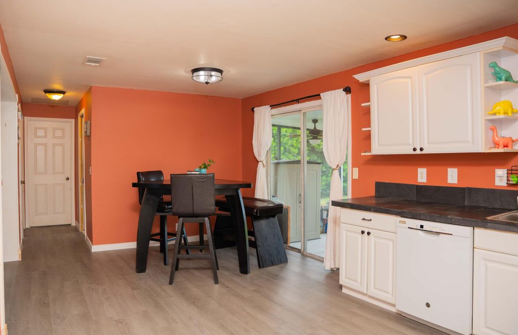 Photo of 1881 SE Manth Lane, Port Saint Lucie, FL 34983 (MLS # B26038033)