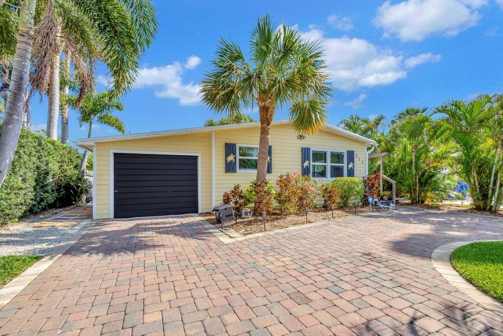 Photo of 313 3rd Street, Jupiter, FL 33458 (MLS # R10985474)
