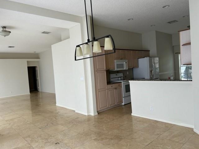 Beautiful 3 bedroom, 2 bathroom home with 1-car garage located in the highly desirable Oasis at Palm Aire Country Club. Enjoy direct access to 3 championship golf courses right in your backyard! The master bedroom features an en-suite bathroom, the kitchen includes an eat-in area, and the home offers a bright Florida room, laundry area, and private patio. Community amenities include a clubhouse with pool, jacuzzi, party room, and gym. Prime location near major highways, shopping, restaurants, and the casino. This is the perfect blend of resort-style living and golf course lifestyle