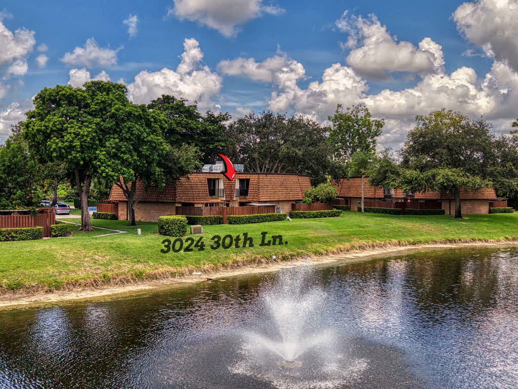 Photo of 3024 30TH Lane, Greenacres, FL 33463 (MLS # B26067651)