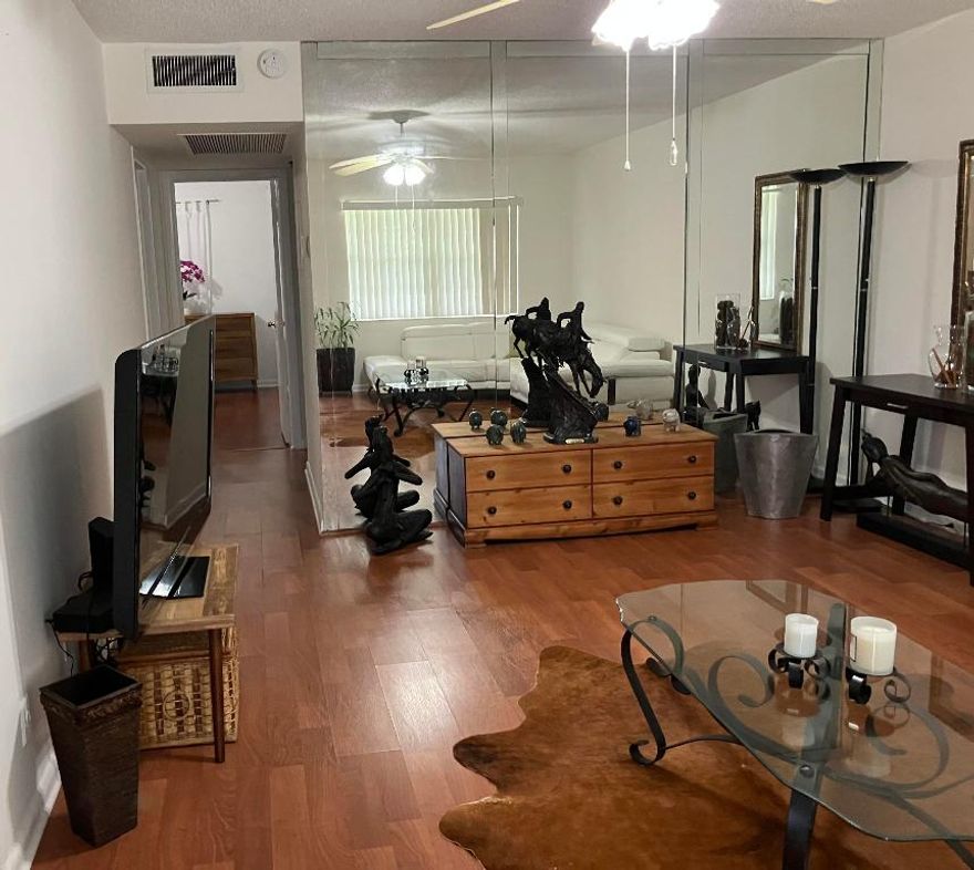 BEAUTIFULL MOVE IN READY HOME FOR SALE IN 55+ COMMUNITY * 2 MASTER BEDROOMS * 1 AND 1/2 BEATIFULLY UPGRATED BATHROOMS* ENCLOSED BALCONY WITH IMPACT WINDOWS, CAN BE USED AS AN OFFICE* LAMINATES FLOORS * CENTRAL A/C * 2nd FLOOR * EXTRAS STORAGE ROOM * LAUUNDRY ROOM IS CONVINIETLY LOCATED ON SAME FLOOR * ASSIGNED PARKING WITH LOTS OF GUESS SPOTS * PICKNICK SOCIAL AREA IN SAME BUIDING  * COMMUNITY OFFER VARIETY OF AMENITIES INCLUDING  * TENNIS COURTS * WATER HEATED POOLS * RESTAURANTS * COMPLIMENTARY TRANSPORTATION * GYM AND MUCH MORE! TRULY A FLORIDA LIFESTYLE !!!