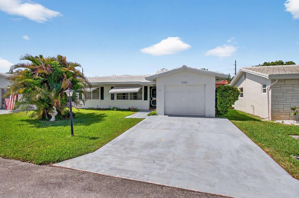 Photo of 2080 SW 14th Avenue, Boynton Beach, FL 33426 (MLS # R11100557)