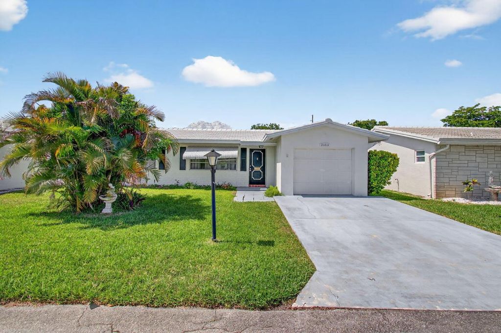 Photo of 2080 SW 14th Avenue, Boynton Beach, FL 33426 (MLS # R11100557)