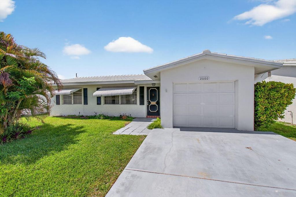 Photo of 2080 SW 14th Avenue, Boynton Beach, FL 33426 (MLS # R11100557)