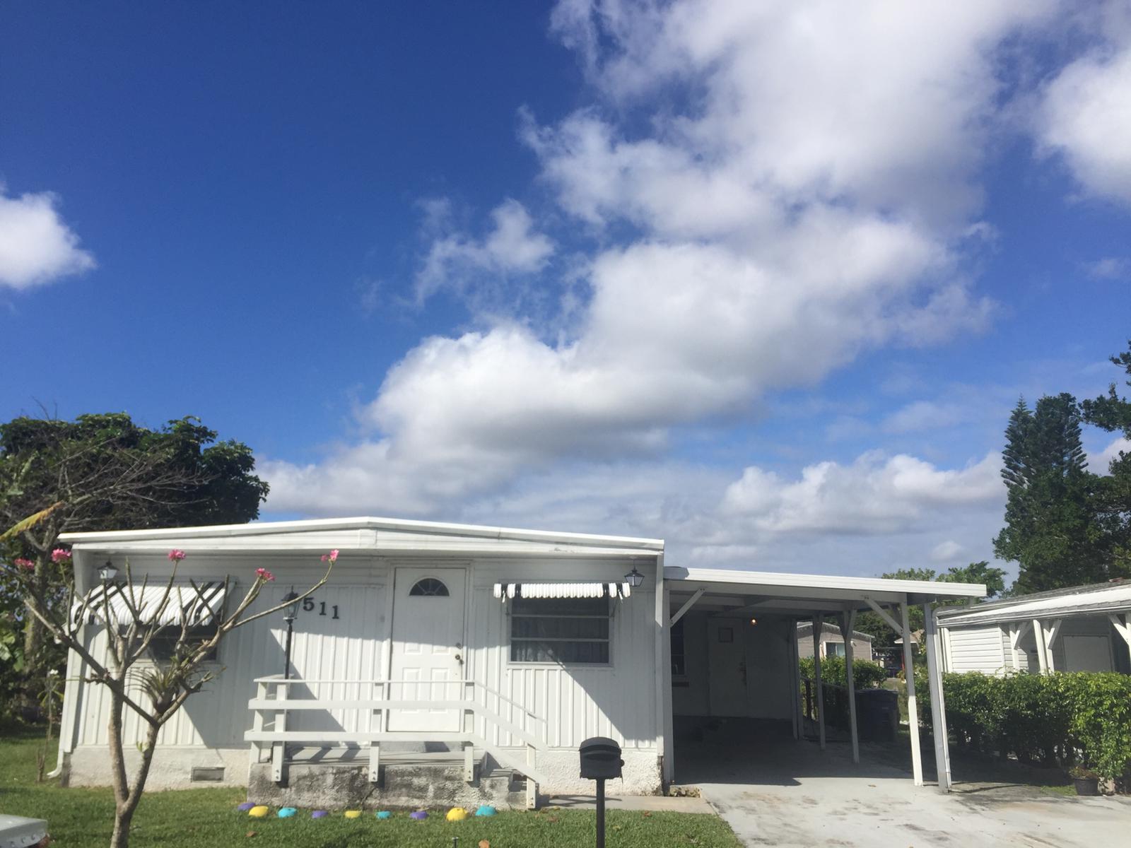 Come see this 3-bedroom waterfront home in Boca Raton featuring a large carport, spacious backyard with deck and water views. Located near major shopping areas and in a top-rated school district, this home offers both comfort and convenience. The HOA maintains the community, so lawn care is never a concern. Don't miss this opportunity--schedule your showing today!