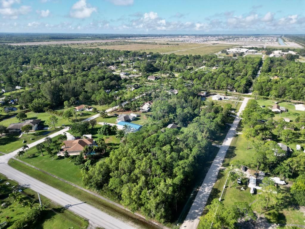Photo of Xxxxx 58 Court N, The Acreage, FL 33411 (MLS # R10973961)