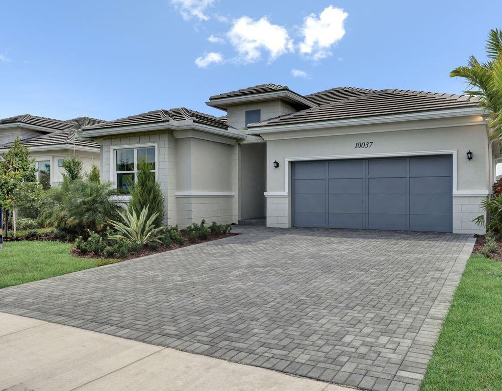 Photo of 10037 Regency Way, Palm Beach Gardens, FL 33412 (MLS # R10980142)
