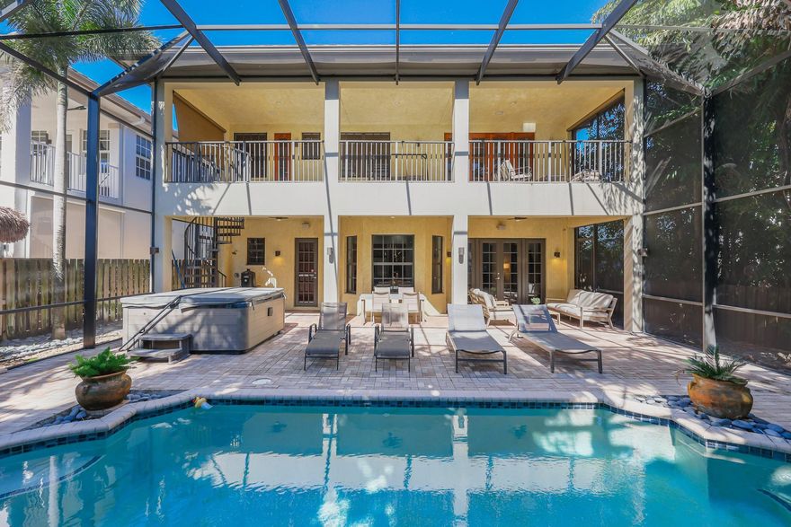 This standout two-story residence delivers scale, style, and a premier location. Featuring 4 bdrms, 3.5 baths, plus a private office and dedicated fitness room, the floor plan is designed for today’s lifestyle.The chef-caliber kitchen showcases granite counters and rich cherry cabinetry, flowing effortlessly into the spacious family room. Full impact windows and doors.Upstairs, the oversized primary suite serves as a true retreat with custom closets and a private covered balcony.The real focal point is outside — a fully enclosed, two-story atrium courtyard that creates a private, resort-style pool and spa oasis wrapped in lush tropical landscaping.Positioned on one of the most sought-after streets in Wilton Manors, opportunities like this are few and far between.