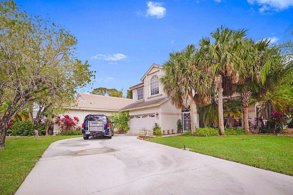 Photo of 213 Pennock Trace Drive, Jupiter, FL 33458 (MLS # R10949012)