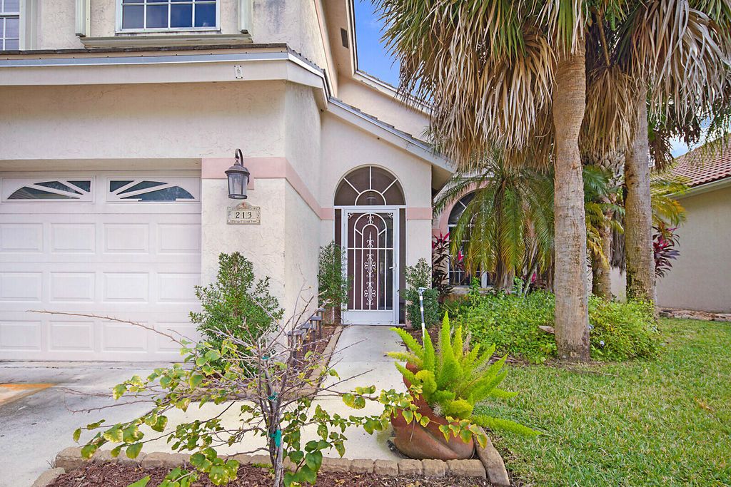 Photo of 213 Pennock Trace Drive, Jupiter, FL 33458 (MLS # R10949012)