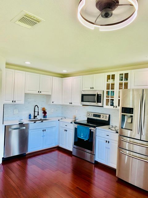 Photo of 6194 Reynolds Street, West Palm Beach, FL 33411 (MLS # B26002206)