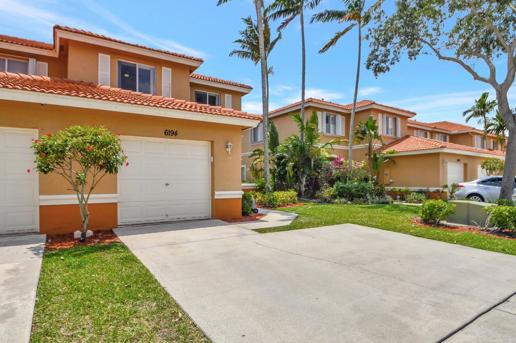 Photo of 6194 Reynolds Street, West Palm Beach, FL 33411 (MLS # B26002206)