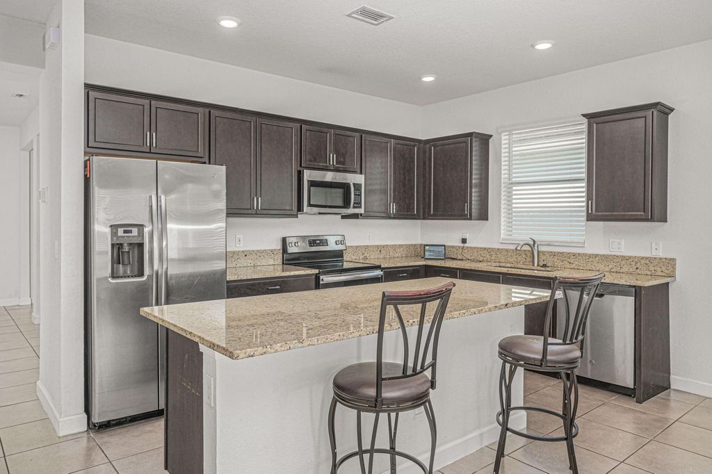 Photo of 7970 NW Greenbank Circle, Port Saint Lucie, FL 34987 (MLS # R10935114)