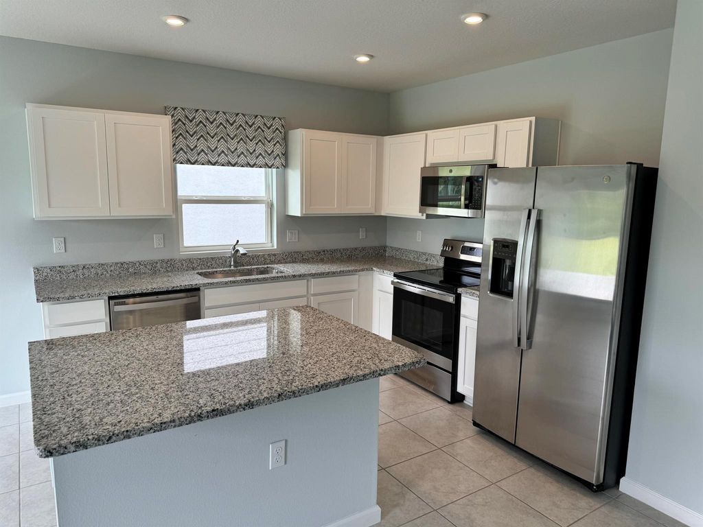 Photo of 347 Clementine Road, Fort Pierce, FL 34981 (MLS # R11021686)