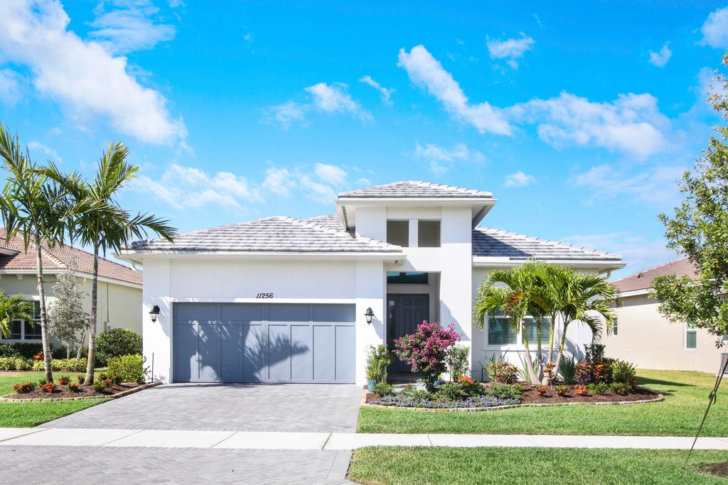 Photo of 11256 SW Lunata Way, Port Saint Lucie, FL 34987 (MLS # R10800419)