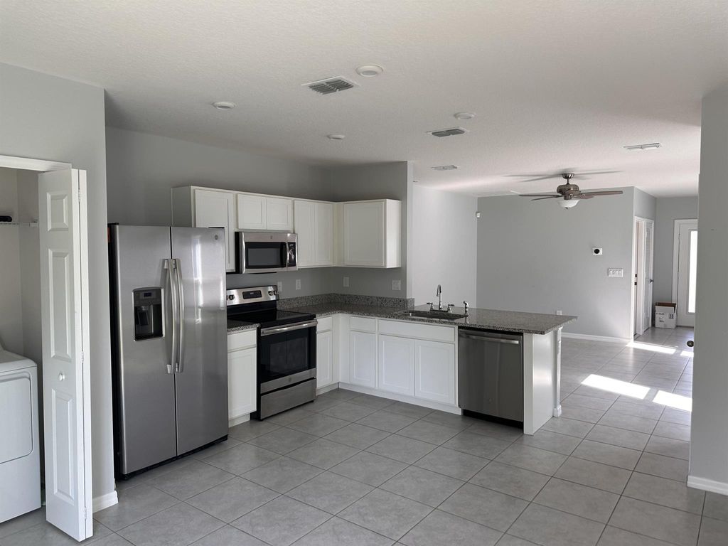 Photo of 3345 Madison Square Lane, Fort Pierce, FL 34982 (MLS # R11021004)