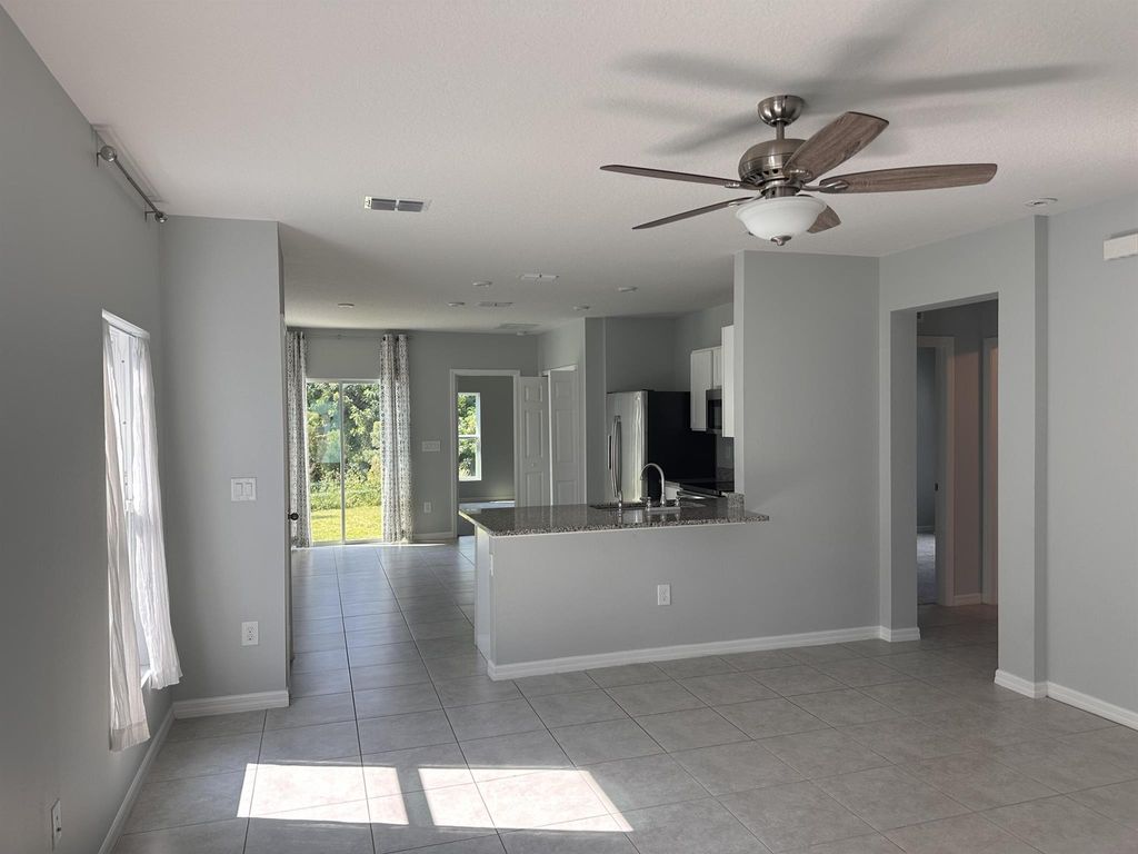 Photo of 3345 Madison Square Lane, Fort Pierce, FL 34982 (MLS # R11021004)