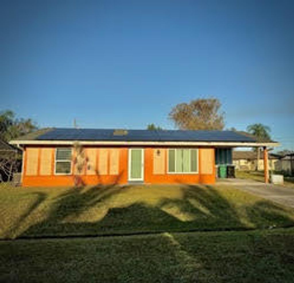 Photo of 423 SE Asbury Lane, Port Saint Lucie, FL 34983 (MLS # R11159016)